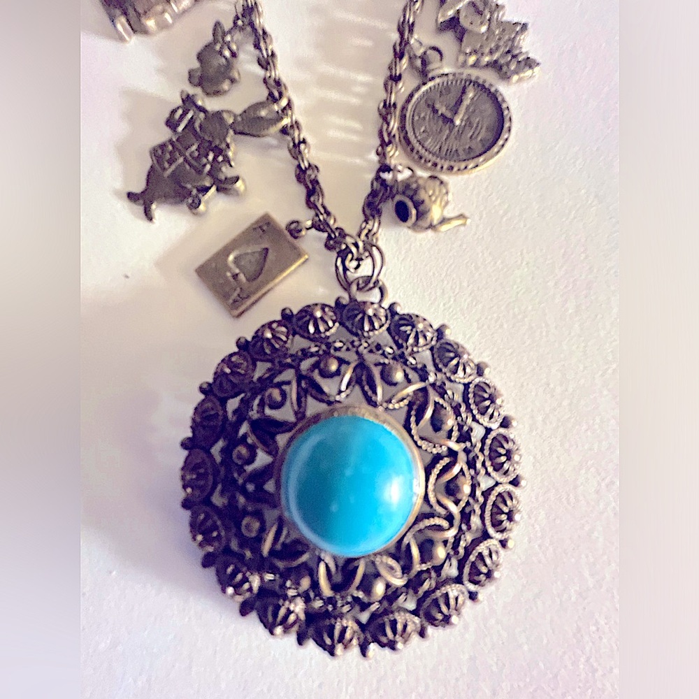 Necklace Alice in Wonderland bronze charms, vintage faux turquoise medallion 30”